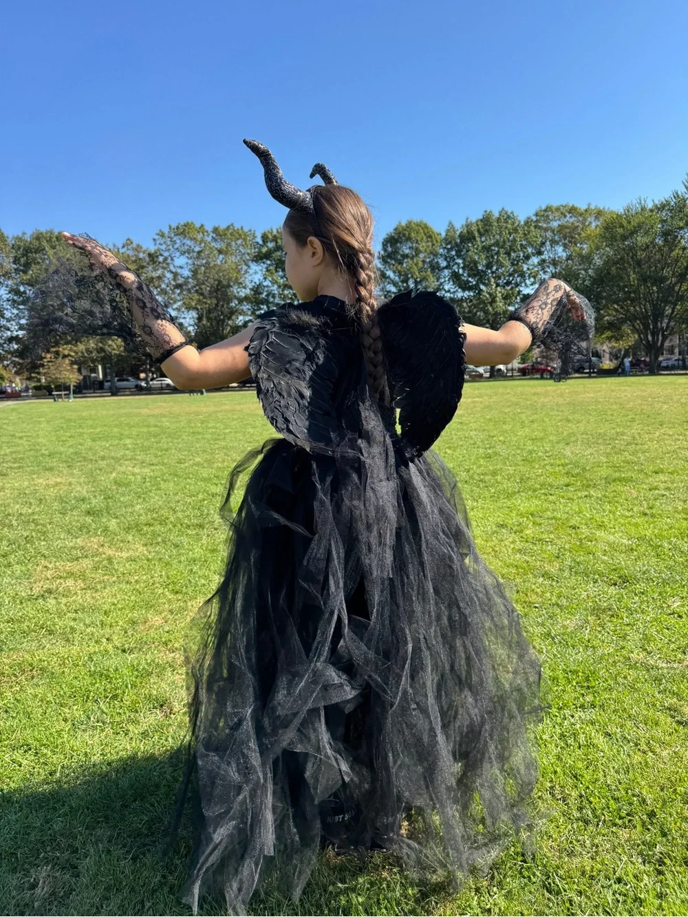 Halloween costume. Black Maleficent-Inspired Kids Costume with Horns and Wings
